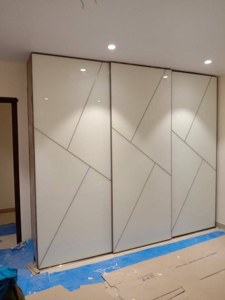 3-Door Acrylic Sliding Wardrobe with Geometric Grooves